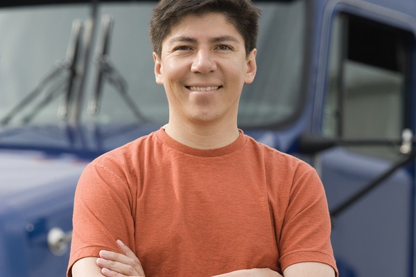 Man standing in front of truck